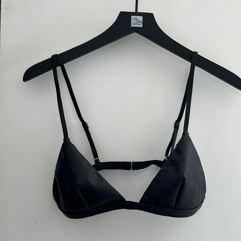 This black bra top is 100% polyester it’s super soft.